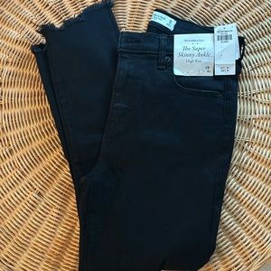 The Super Skinny Ankle High Rise Jeans in Distressed Black